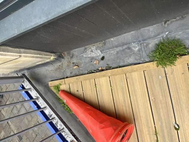 Exterior mezzanine decking inspected during a needle and sharps sweep in central Bristol